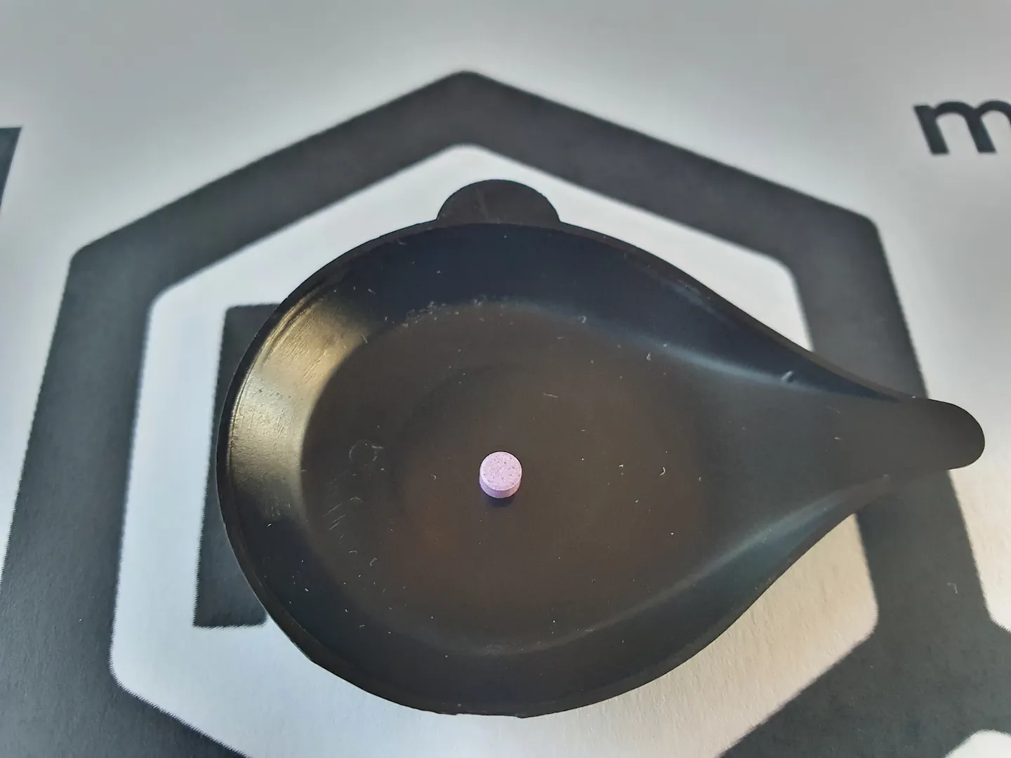 1cP-LSD Pellet Detected Using the LSD Test Kit in Drug Checking 1cP-LSD pellet shown during a drug checking session with the LSD test kit for accurate potency measurement.
